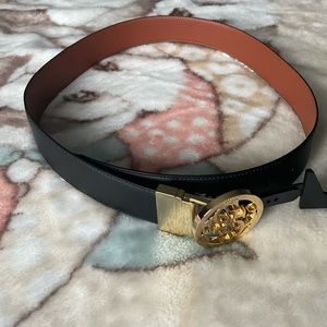 Guess reversible belt.  Medium, black and brown with Guess buckle!